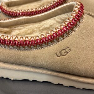 UGG Tan Slip-On Fleece-Lined Slippers with Red Trim